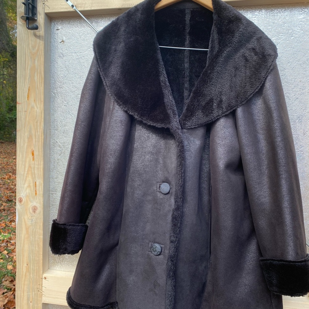Maggie Barnes Faux Fur and Faux Leather Jacket. Wide lapel adds sophistication.